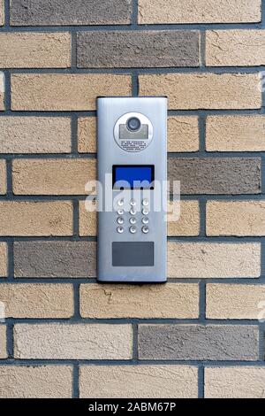 safety in modern residential buildings. electronic lock at the entrance to a residential building. Stock Photo
