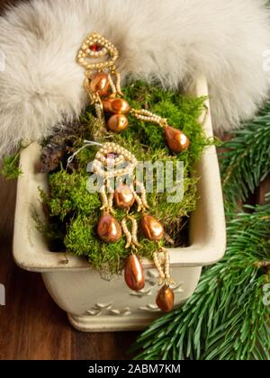 Jewellery with Christmas creative decoration background Stock Photo