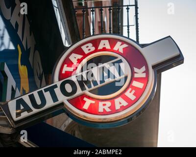 VIENNA, AUSTRIA - NOVEMBER 6, 2019: Austrian tobacconist sign, also called tabaktrafik automat, in the city center of Vienna. It is a typical design t Stock Photo