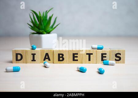 diabetes word in crossword style block letters background in health care and healthy nutrition concept Stock Photo