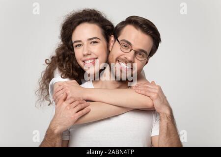 Portrait of happy loving couple posing looking at camera Stock Photo