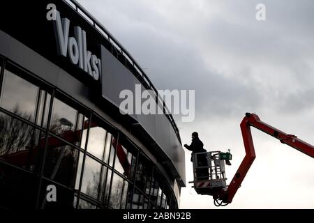 Brunswick, Germany. 28th Nov, 2019. Workers put plates in front of the hall name. At the sponsor's request, the 'Volkswagen Halle' lettering will be concealed during the AfD federal party congress. The AfD is holding its federal party conference in Braunschweig from 30 November to 1 December. Credit: Sina Schuldt/dpa/Alamy Live News Stock Photo