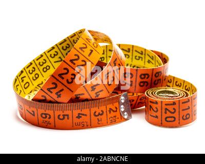Tailoring old measuring tape isolated Stock Photo