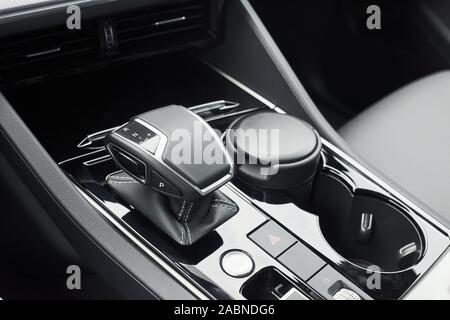 A fragment of the modern car saloon and a gearbox in an expensive car. Stock Photo