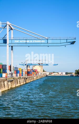 The two large container cranes on the Trade dock in the north container terminal of the autonomous port of Strasbourg, second river port in France. Stock Photo