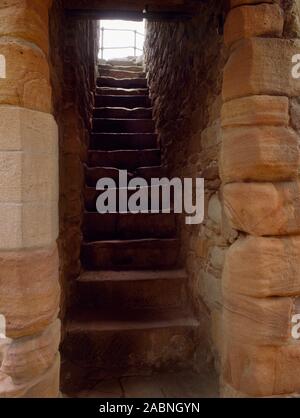 View ESE looking up the internal stairs of the D-shaped C13th Welsh Tower in the upper ward of Ewloe Castle, Flintshire, Wales, UK. Stock Photo