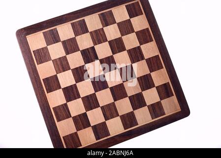 Empty chess board isolated on white background Stock Photo
