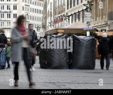 Munich, Germany. 28th Nov, 2019. Large water sacks serve as security barriers in an access area to the Munich Christmas Market. They are supposed to serve as a barrier after attacks on Christmas markets. Credit: Jennifer Weese/dpa/Alamy Live News Stock Photo