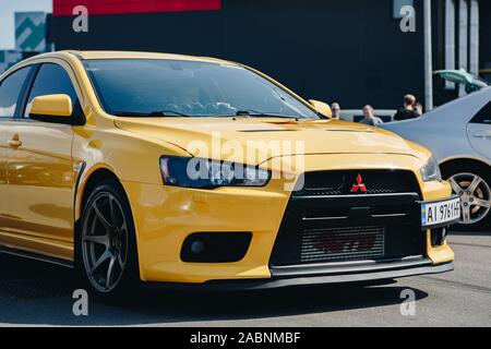 KYIV-28 JULY,2019: JDM car show outdoor.Tuned Japanese drift cars expo in summer.Modified Mitsubishi Lancer Evolution X vehicle with lowered suspensio Stock Photo