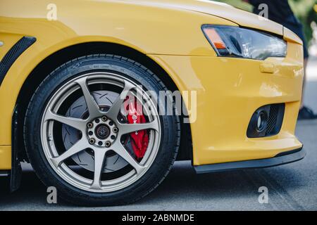 KYIV-28 JULY,2019: JDM car show outdoor.Tuned Japanese drift cars expo in summer.Modified Mitsubishi Lancer Evolution X vehicle with lowered suspensio Stock Photo