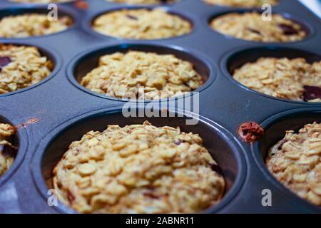 Homemade Breakfast Oatmeal Muffins in muffin tray Stock Photo
