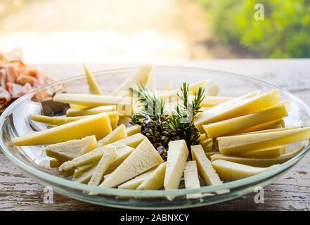 cheese wedges on a plate slices of pecorino Stock Photo