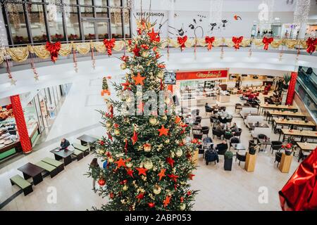 Kehl, Germany - Dec 13, 2016: View from above of large fir tree inside City Center Kehl supermarket and Dreher Cafe Marktkuche Stock Photo