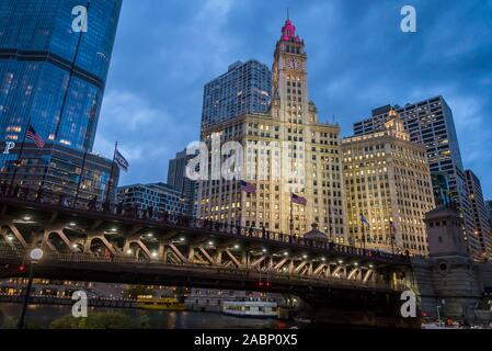 The Wrigley Building, a 1924 landmark skyscraper and clocktower, and DuSable Bridge, Chicago, Illinois, USA Stock Photo