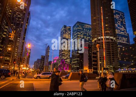 People walking along North Michigan Avenue at night, Chicago, Illinois, USA Stock Photo