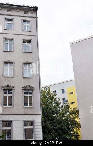 Walking through the streets in the Friedrichshain district on a rainy day, Berlin Stock Photo