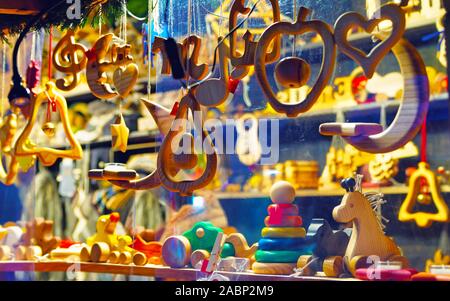 Stand with wooden toys and Christmas tree decorations reflex Stock Photo