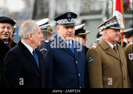 Commander of Provincial Pomeranian Police, Jaroslaw Rzymkowski attends the 101st anniversary of the creation of the Polish Navy.During the ceremony for the first time war flag of an ORP Slazak ship was raised. ORP Slazak is a Polish patrol corvette class ship. The unit is a part of the Battle Ship Squadron of the 3rd Ship Flotilla. The ship's purpose is to combat surface and aerial targets and asymmetrical threats, as well as patrol and protect approach routes and sea communication lines, escort and protect commercial units. The unit is also adapted to control sea routes as part of multination Stock Photo