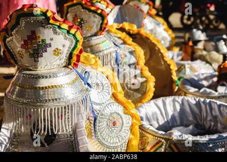 Detail Typical Bolivian costumes for men to dress up in carnival and dance the caporales Stock Photo