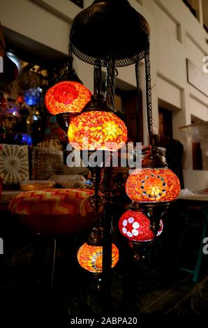 Vertical Image of Arabian Style Colorful Hanging Mosaic Lanterns at Night Stock Photo