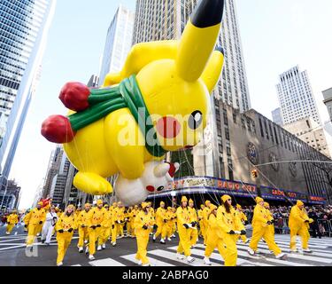 The Pokemon Pikachu balloon at the Macy's Thanksgiving Day Parade on Sixth Avenue near Radio City Music Hall. Stock Photo