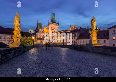 Karluv most, Charles Bridge at dusk, in the back old town bridge tower, Prague, Bohemia, Czech Republic Stock Photo