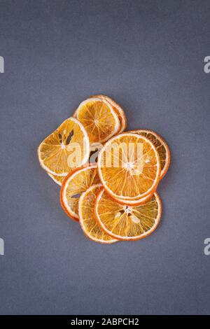 Dried oranges slices isolated on grey background, book cover template design, wrapping design Stock Photo