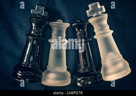 Black and white kings and queens in Chess Stock Photo
