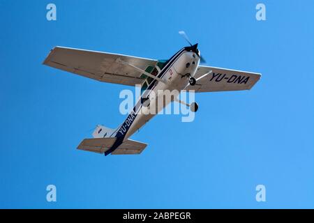 Vrsac, Serbia, September 22, 2019. Manifestation 'The 62nd Grape Harvest'. A small sports plane above town throws out award coupons and grape packages Stock Photo