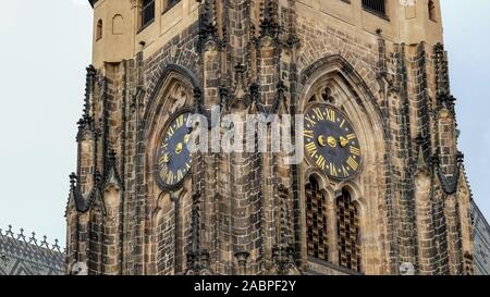 a close up shot of the clock tower of st vitus cathedral in prague castle, czech republic Stock Photo