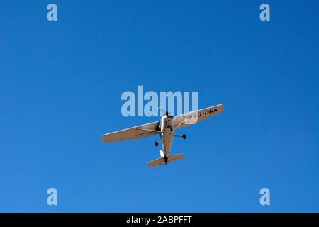 Vrsac, Serbia, September 22, 2019. Manifestation 'The 62nd Grape Harvest'. A small sports plane above town throws out award coupons and grape packages Stock Photo