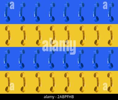 Seamless pattern of retro style telephone, telephone handset isolated on blue and yellow background Stock Photo