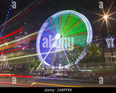 multicoloured ferris wheel at christmas in Leeds, England Stock Photo