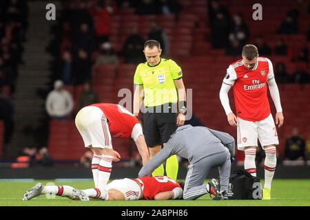 London, UK. 28th Nov, 2019. David Luiz of Arsenal (M) receives medical treatment after pulling up injured during the first half. UEFA Europa league group F match, Arsenal v Eintracht Frankfurt at the Emirates Stadium in London on Thursday 28th November 2019. this image may only be used for Editorial purposes. Editorial use only, license required for commercial use. No use in betting, games or a single club/league/player publications . pic by Steffan Bowen/Andrew Orchard sports photography/Alamy Live news Credit: Andrew Orchard sports photography/Alamy Live News Stock Photo