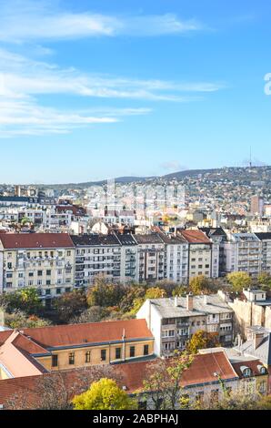 Cityscape of the Hungarian capital city Budapest. Historical buildings along with communist architecture and socialist block of flats. Hungarian town skyline. Eastern European cities. Stock Photo