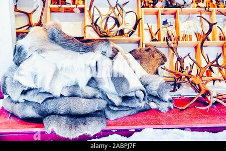 Winter Saami Souvenirs such as reindeer fur horns reflex Stock Photo