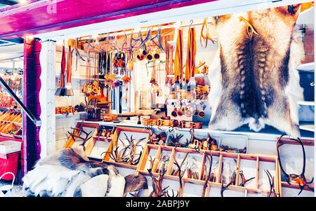 Market counter with reindeer skin and horns reflex Stock Photo