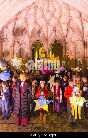 Winchester, Hampshire, UK. 28th November 2019. Crowds flocks to Winchester for the Winchester Christmas Lantern Parade, to show the wonderful lanterns they have created or to watch the parade which starts and finishes at Winchester Cathedral.  Credit: Carolyn Jenkins/Alamy Live News Stock Photo