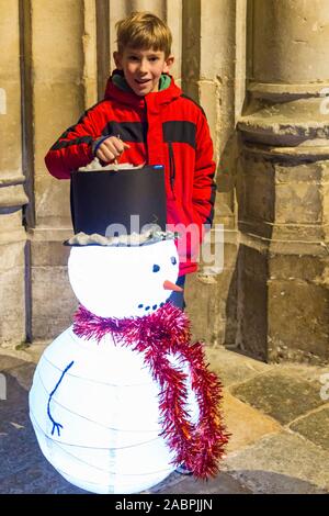 Winchester, Hampshire, UK. 28th November 2019. Crowds flocks to Winchester for the Winchester Christmas Lantern Parade, to show the wonderful lanterns they have created or to watch the parade which starts and finishes at Winchester Cathedral.  Credit: Carolyn Jenkins/Alamy Live News Stock Photo