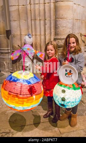 Winchester, Hampshire, UK. 28th November 2019. Crowds flocks to Winchester for the Winchester Christmas Lantern Parade, to show the wonderful lanterns they have created or to watch the parade which starts and finishes at Winchester Cathedral.  Credit: Carolyn Jenkins/Alamy Live News Stock Photo