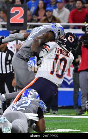 Detroit, Michigan, USA. 28th Nov, 2019. Chicago Bears QB Mitchell Trubisky (10) gets hit and wrapped up after throwing a pass during NFL game between Chicago Bears and Detroit Lions on November 28, 2019 at Ford Field in Detroit, MI (Photo by Allan Dranberg/Cal Sport Media) Credit: Cal Sport Media/Alamy Live News Stock Photo