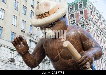 New York, NY - November 28, 2019: Smokey Bear giant balloon flown low because of high wind at 93rd Annual Macy's Thanksgiving Day Parade alone Central Park West Stock Photo