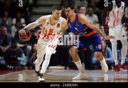 Belgrade. 28th Nov, 2019. Crvena Zvezda's Billy Baron (L) vies with Valencia's Alberto Abalde during regular season round 11 Euroleague basketball match in Belgrade, Serbia on Nov. 28, 2019. Credit: Predrag Milosavljevic/Xinhua/Alamy Live News Stock Photo