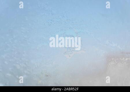 Texture of frost patterns on the window. Abstract winter background Stock Photo