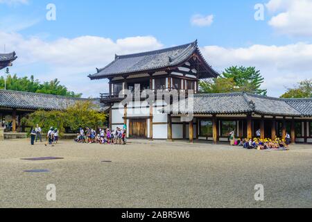 Ikaruga, Japan - October 5, 2019: View of the Horyu-ji compound, with visitors, it is a Buddhist temple in Ikaruga, Nara prefecture, Japan Stock Photo