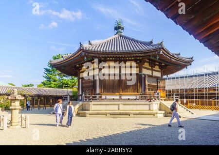 Ikaruga, Japan - October 5, 2019: View of the Horyu-ji compound and Yumedono, with visitors, it is a Buddhist temple in Ikaruga, Nara prefecture, Japa Stock Photo