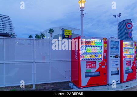 Kobe, Japan - October 11, 2019: Typical street vending machines, illuminated. Japan Stock Photo