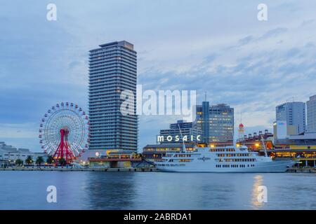 Kobe, Japan - October 11, 2019: Sunset view of the Port, with the Children Museum and other landmarks, in Kobe, Japan Stock Photo