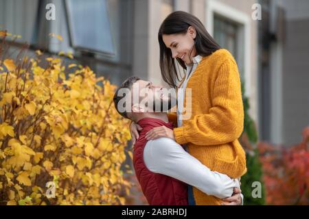 Dating time. Joyful nice couple enjoying their time while having a romantic date Stock Photo