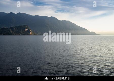 Scenic view of the Lake Maggiore at sunset on ferry boat cruising Luino to Stresa, Piedmont, Italy Stock Photo